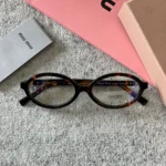 Miu-Miu-Regard-Sunglasses-Burnt