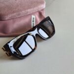 Miu Miu MU 09WS VAU06B Sunglasses