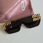 Miu Miu MU 09WS VAU06B Sunglasses