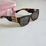 Miu Miu MU 09WS VAU06B Sunglasses