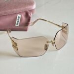 Miu Miu Metal Rimless Wrap Sunglasses
