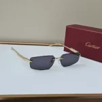 Cartier CT0544S Sunglasses Gold Navy Blue