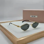 Miu Miu MU 56ZS sunglasses Gold Black