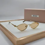 Miu Miu MU 56ZS sunglasses Gold Mustard Yellow