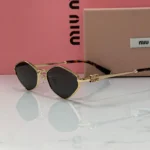 Miu Miu MU56ZS Sunglasses Gold Black